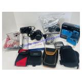 Lot of Cameras with Manuals, Cases, Cords, And