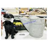 Damaged Resin Dog, Watering Can, Old Chainsaw