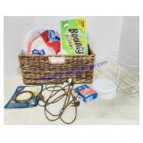 Basket of Paper Goods and Household Items
