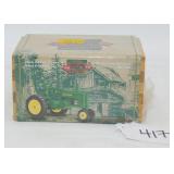 1/64th Scale Ertl JD Model A w/ Farmer