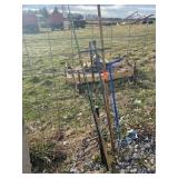 Fishing poles and garden tools lot 313