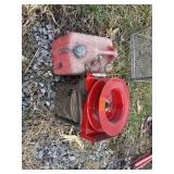 Hose reel, fan, gas can, tag 394