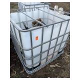 Plastic tote and contents including nails, tag