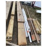 Stack of lumber, center in photo, tag 465