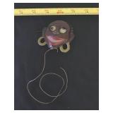 Black Americana Tin Toy Pin Google Eyes