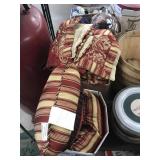 Assorted bedding and pillows