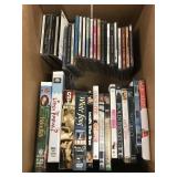 CDs and VHS tape assortment