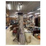 Visible gas pump with measures and cracked glass