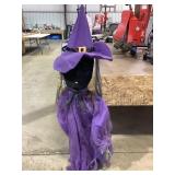 Hanging talking witch Halloween decor