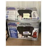 Battery back up sump pump system