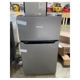 Hisense refrigerator freezer 33x21x19 has dent