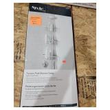Tension pole shower caddy