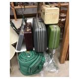 Luggage, briefcases, sleeping bag, shower seat