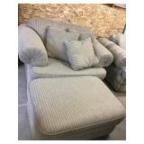 Overstuffed chair and ottoman