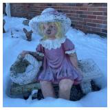 Lawn Ornament, Girl on Bench, has cracking & wear