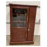 ROLL AROUND GLASS FRONT MEDIA CENTER - 28' X 44' X