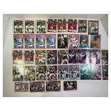 287.  Lot of (38) Jim Kelly Buffalo Bills Football