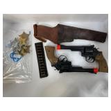 918.  Box of Vintage Toy Guns, Badges, Leather Hol