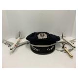 UPS toy planes and American Airlines pilots cap -
