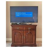 LG 48' FLATSCREEN TV WITH STAND AND DVD PLAYER