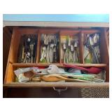 CONTENTS OF SILVERWARE DRAWER IN KITCHEN -