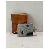 UNIVERSAL MINUTE 16 CAMERA  AND LEATHER BAG