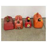 LOT OF FOUR RED PLASTIC GAS CANS
