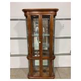 GLASS FRONT LIGHTED CURIO CABINET W/ CURVED GLASS