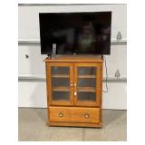 ROLL AROUND OAK GLASS FRONT TV OR STORAGE CABINET-