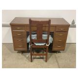 9 DRAWER OFFICE DESK WITH CHAIR. AND 2 METAL LEG