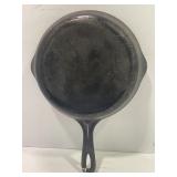 #6 CAST IRON SKILLET WITH 1056 B STAMPED ON BACK