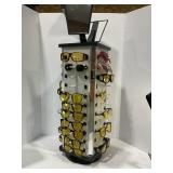 SUNGLASSES STORE DISPLAY WITH LARGE SELECTION OF