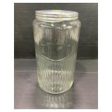 SELLERS GLASS RIBBED JAR WITH ORIGINAL LID -7 3/4"