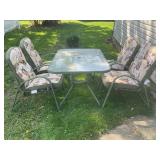 GLASS TOP PATIO TABLE WITH 4 CHAIRS & CUSHIONS