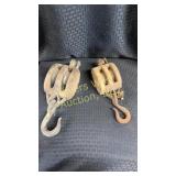 Two wooden double pulleys approximately 12ï¿½ long