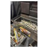 Rubbermaid tool box filled with tools including
