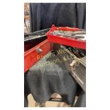 Two toolboxes filled with assorted tools