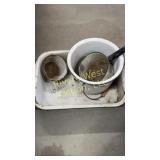 Assortment of enamel pots and pans