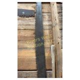 Two man crosscut saw approximately 6 feet long