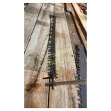 Two man crosscut saw approximately 5 feet long