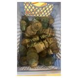 Crate of glass insulators of various colors and
