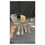 Assortment of bottle openers and knickknacks
