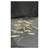Assortment of beer, church keys (beer bottle