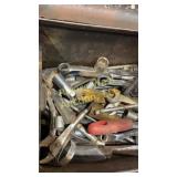 Metal tool box full of sockets and wrenches