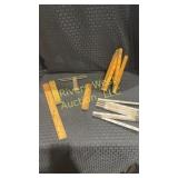 Assortment of antique/vintage folding rulers,