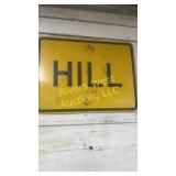 Hill road sign