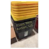 Nine black storage totes with eight lids
