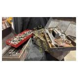Two tool boxes filled with assorted tools