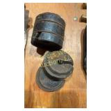 Stack of five Platform scale weights