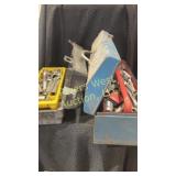Two tool boxes filled with assorted tools include